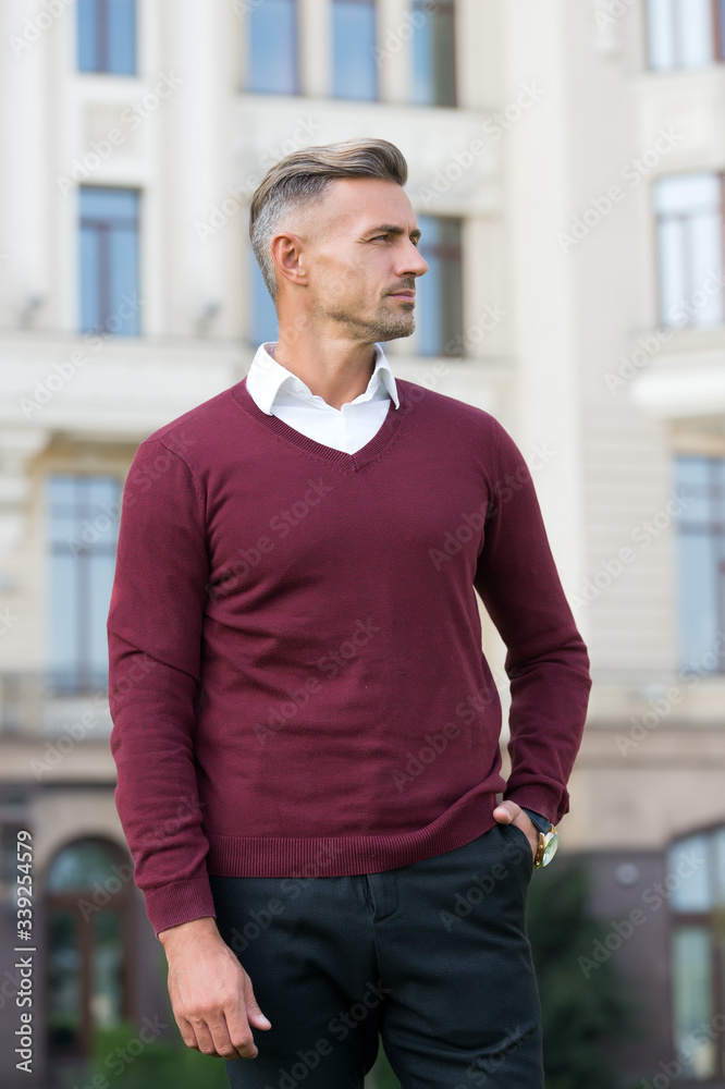 Looking good. waiting for business meeting. handsome man wear jumper. stylish guy has gray hair. male with trendy look. male fashion and beauty. full of confidence. businessman wear casual outfit Looking good. waiting for business meeting. handsome man wear jumper. stylish guy has gray hair. male with trendy look. male fashion and beauty. full of confidence. businessman wear casual outfit