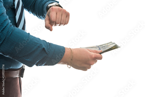 Male hand in suit giving us dollar isolated on white background. Close up