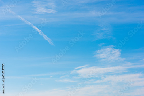 Small clouds in the blue sky in springtime © Gabriele Maltinti