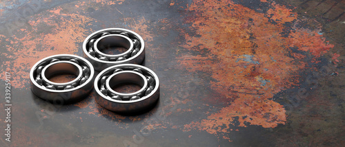 Ball bearings, on metal rusty background. Auto service concept. 3d illustration