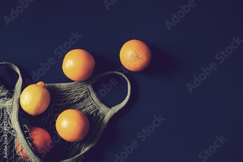 Oranges and lemon in the eco net bag. Caring for the environment, recycling