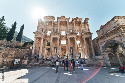 The ruins of Celsus Library in Ephesus at sunny evening sun. Beautiful light of the old ancient rocks and stones, turkey photo