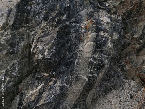texture of chert rock in the nature. Chert is a sedimentary rock composed of microcrystalline or cryptocrystalline quartz, the mineral form of silicon dioxide.