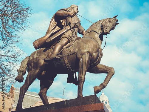 Lviv, Ukraine - December 08, 2019: Monument To King Danylo. Streets and architecture of the old city of Lviv photo