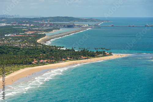 Pontal do Cupe beach, Ipojuca, near Recife, Pernambuco, Brazil on March 1, 2014. In the background, the port of Suape. Aerial view