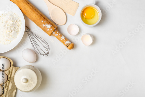 cooking pancake on white background top view ingredients for making