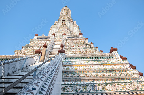 Wat Arun temple in a blue sky. Wat Arun is a Buddhist temple in Bangkok  Thailand.