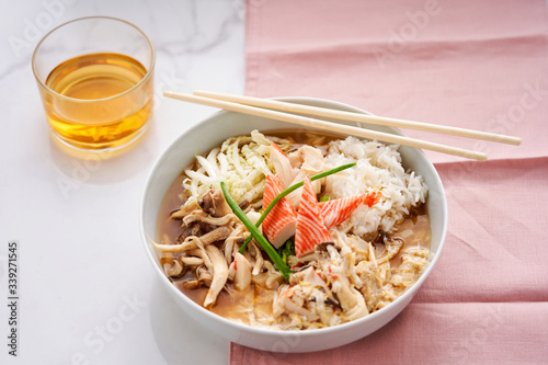 Asian-style bowl with mushrooms, rice and surimi