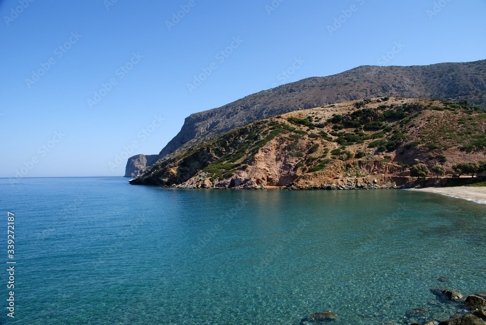 the turquoise clear sea of the Greek island beckoning in summer heat
