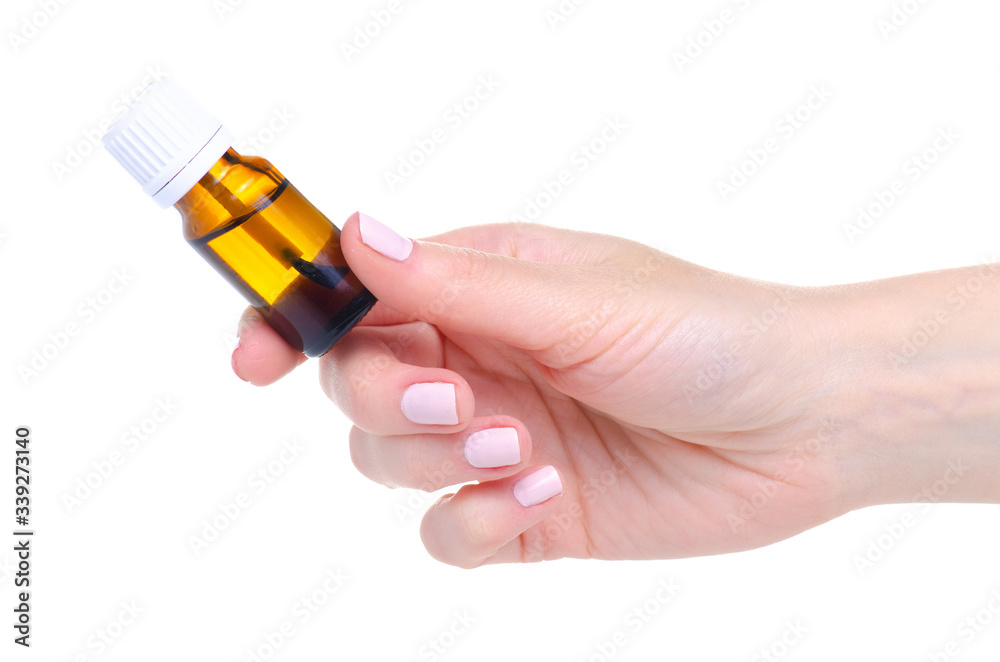 Bottle Nail Oil Cuticle in hand on white background isolation Bottle Nail Oil Cuticle in hand on white background isolation