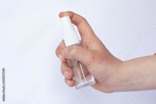 Hand with an antiseptic. Spray antiseptic. Antibacterial and disinfectant in a bottle