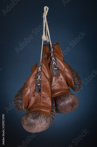 old vintage brown leather boxing gloves