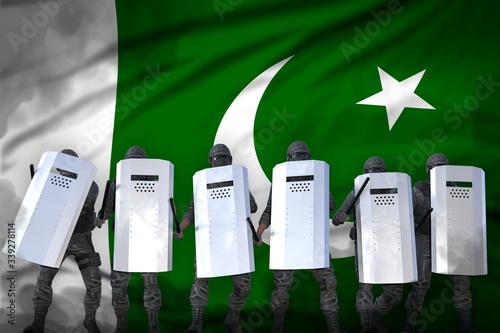 Wallpaper Mural Pakistan protest stopping concept, police officers protecting order against mutiny - military 3D Illustration on flag background Torontodigital.ca