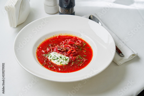 Russian-style beetroot and tomato borscht soup photo