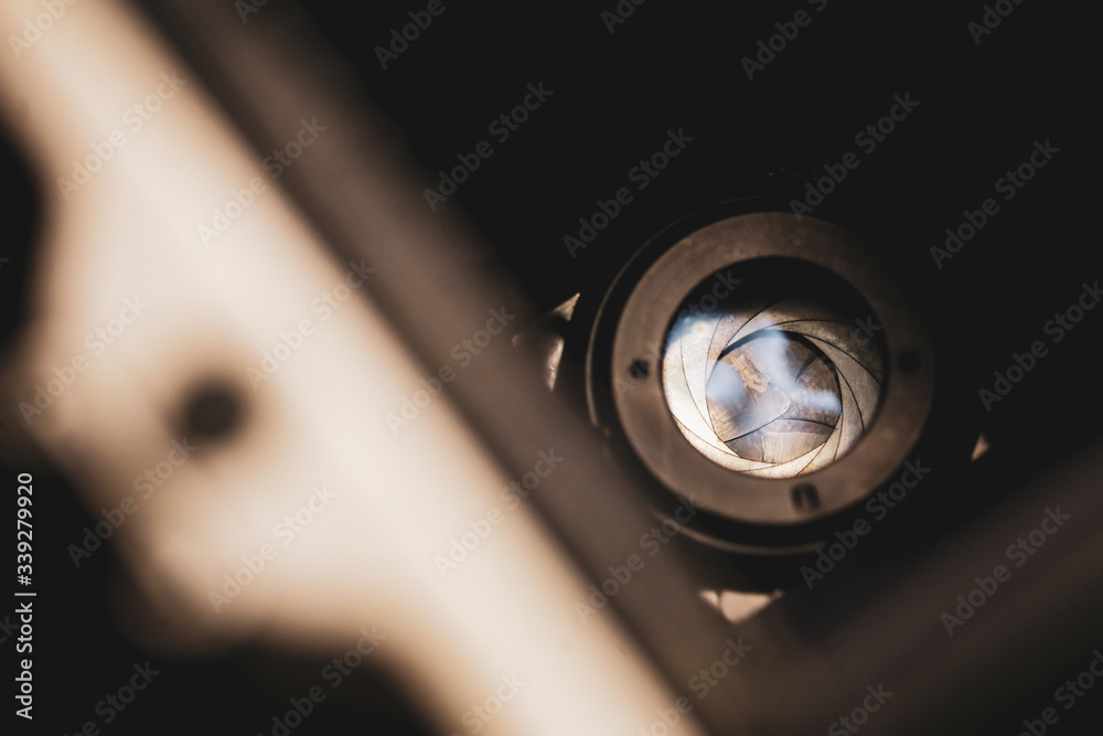 Shallow depth of field (selective focus) details of the shutter diaphragm mechanism in an old bowels photo camera. Shallow depth of field (selective focus) details of the shutter diaphragm mechanism in an old bowels photo camera.