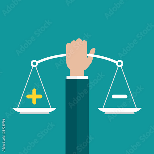 Businessman hand holds mechanical scales with plus and minus in pans. value, solution and rationality balance.