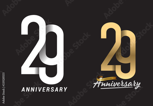 29 years anniversary celebration logo design. Anniversary logo Paper cut letter and elegance golden color isolated on black background, vector design for celebration, invitation card, and greeting photo