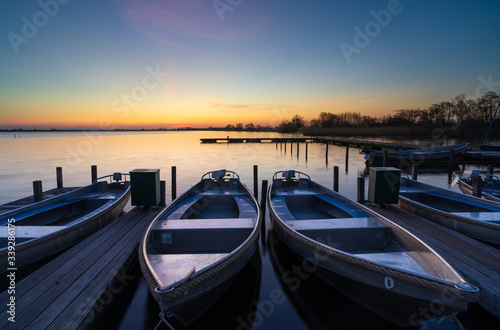 Spring dawn at a small marina at a lake in Holland.