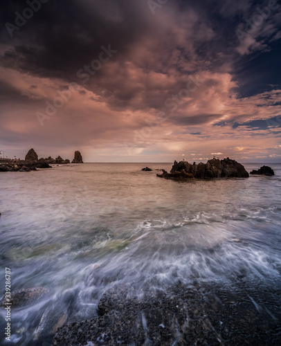 Beautiful view of the Faraglioni in Aci Trezza photo