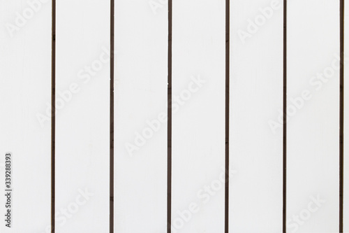 White wood texture background. Vertical lines. of boards.
