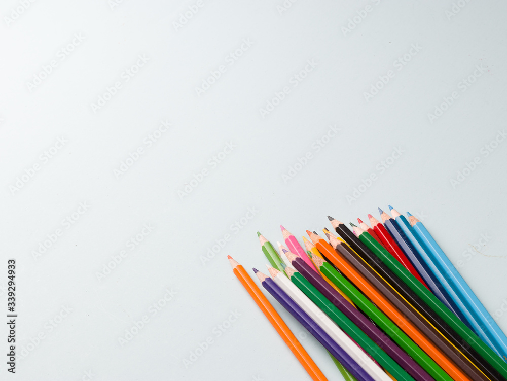 Fototapeta premium colourful pencils isolated templates to be used as background.