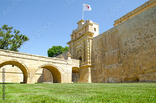 Arched bridge leading to the main (Vilhena) Gates of the Mdina Citadel. Near Rabat, Malta photo