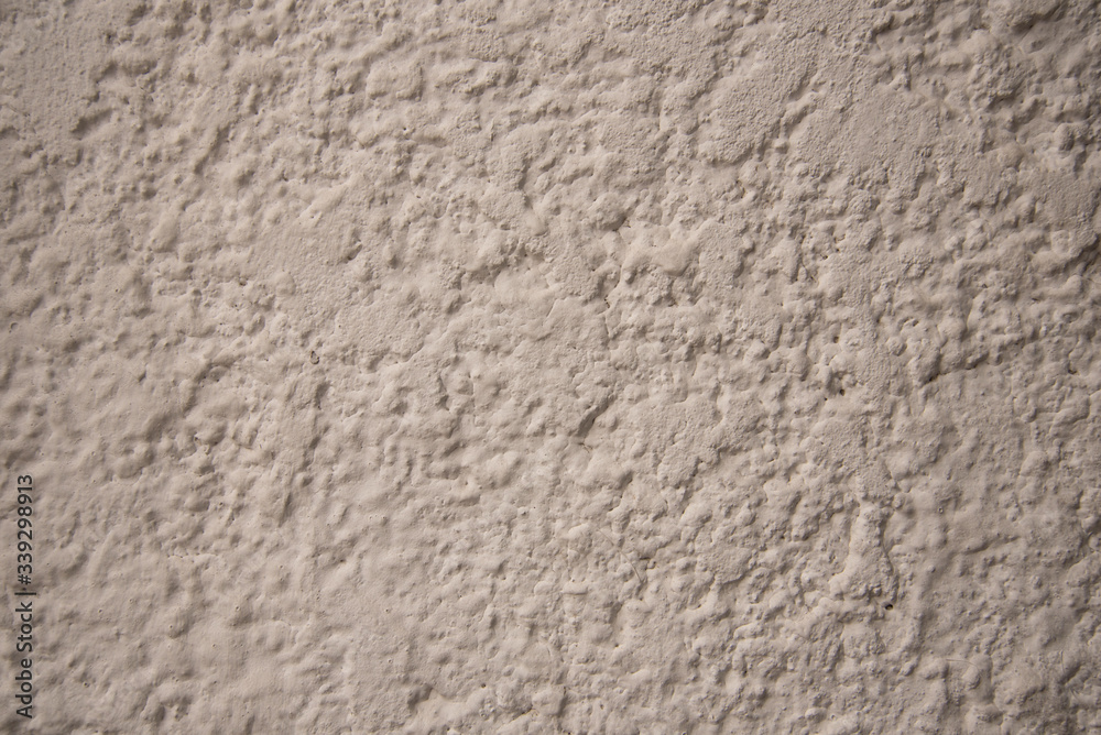cream wall texture background. Close-up, pastel colors. cream wall texture background. Close-up, pastel colors.