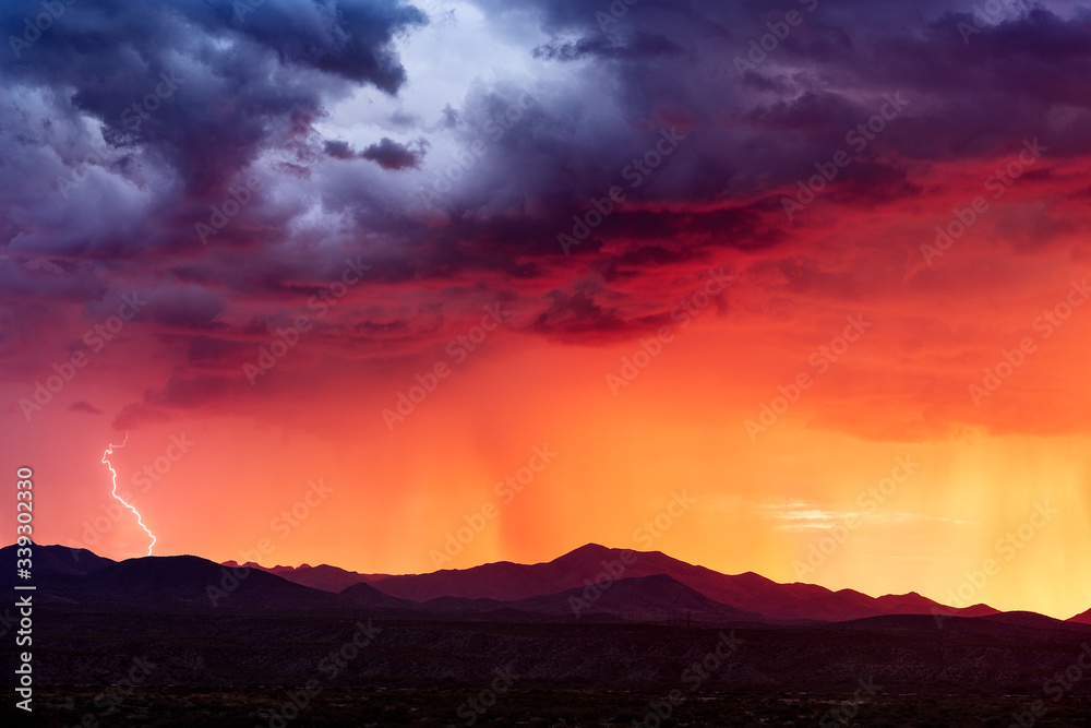 Sunset with monsoon storm clouds in the Arizona desert Sunset with monsoon storm clouds in the Arizona desert