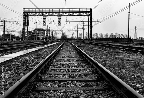 Empty railroad tracks on a rainy day