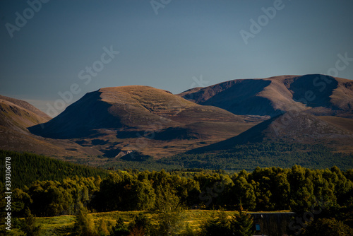 cairngorm mountain range in the Scottish highlands during summer