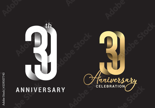 39 years anniversary celebration logo design. Anniversary logo Paper cut letter and elegance golden color isolated on black background photo