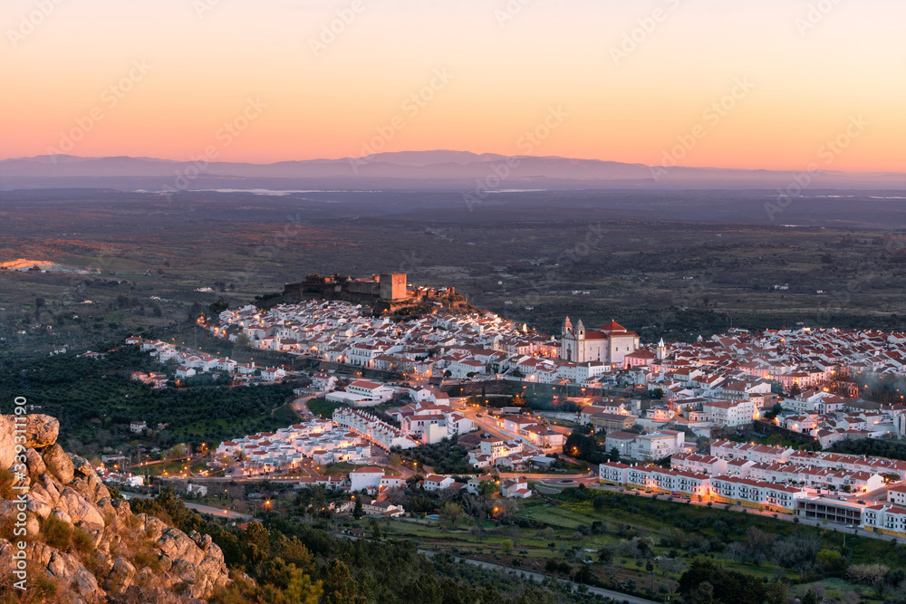 Fototapeta premium Castelo de Vide in Alentejo, Portugal from Serra de Sao Mamede mountains at sunset