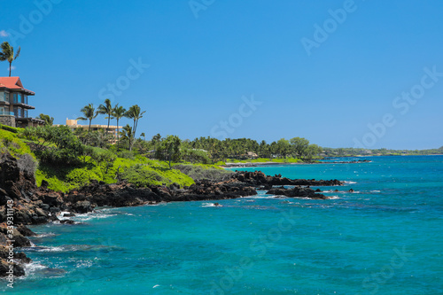 Coastal View in Wailea Maui Hawaii of Turquoise Pacific Ocean, Lush Greenery and Volcanic Rock