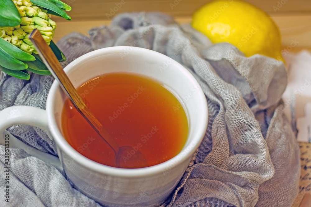 Cup of black tea with a spoon close-up, top view Cup of black tea with a spoon close-up, top view