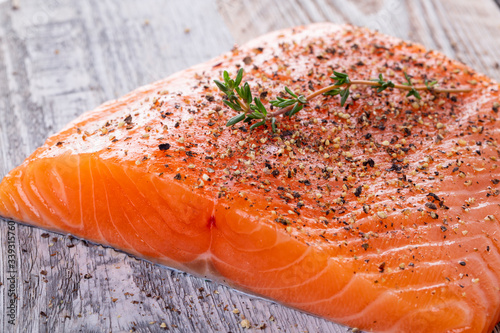 Nayad Scandinavian style fresh salmon filet covered pepper mix photo