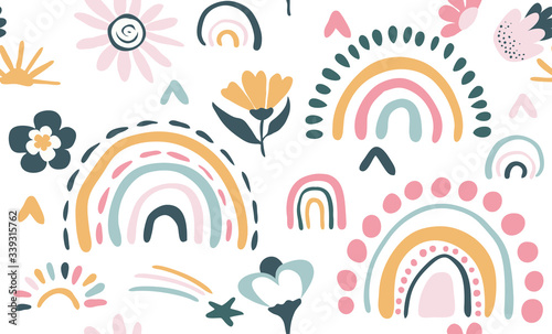 Seamless vector pattern with hand drawn rainbows and sun.