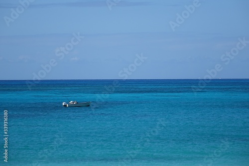 BOAT IN THE SEA OF BIMINI BAHAMAS © Manikini