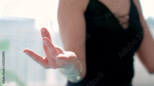 Wallpaper Mural Young woman with black hair in leggins doing yoga excersices at home in loft studio available sun light shot in 4k Torontodigital.ca