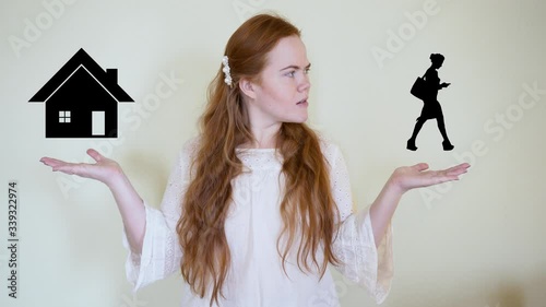 woman asks you to stay home.A coronavirus pandemic can kill. points with his hands at the house on one side street on the other, she is red-haired and beautiful with blue eyes.the virus is dangerous