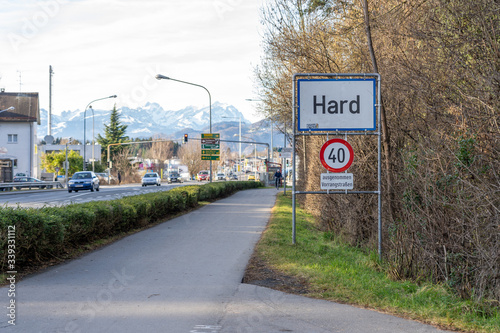 Guidepost of Hard , small Austria town close to Germany border, with road sign written "Except Priority Road" in German