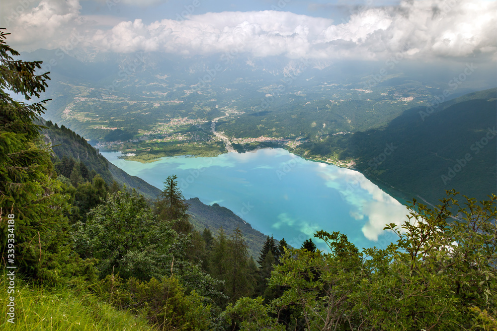 Panoramic view of Santa Croce lake and Alpago municipality in the Province of Belluno in region of Veneto, Italy