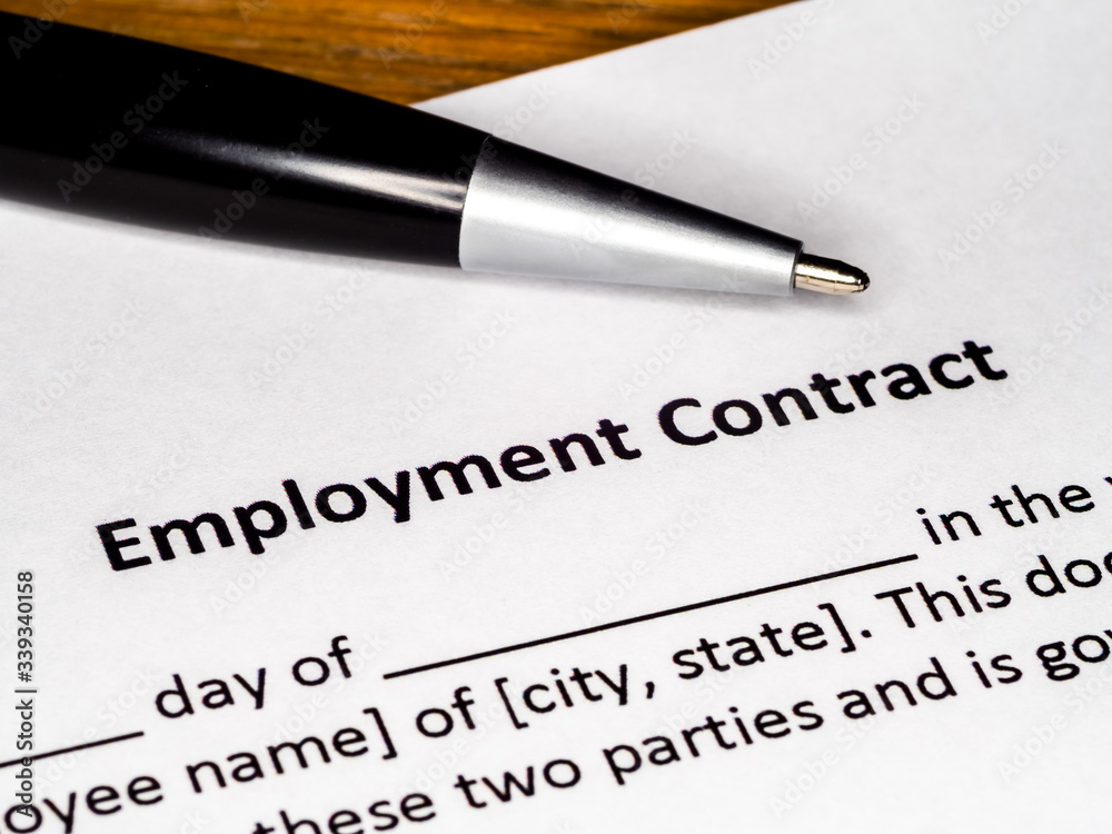 Employment contract form with pen close-up. Concept for job application, success, work, career, stability and future. Employment contract form with pen close-up. Concept for job application, success, work, career, stability and future.