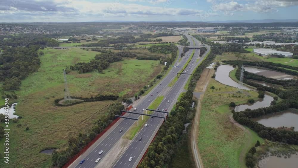 Static aerial view of cars driving on Eastlink highway in Melbourne, Australia Static aerial view of cars driving on Eastlink highway in Melbourne, Australia
