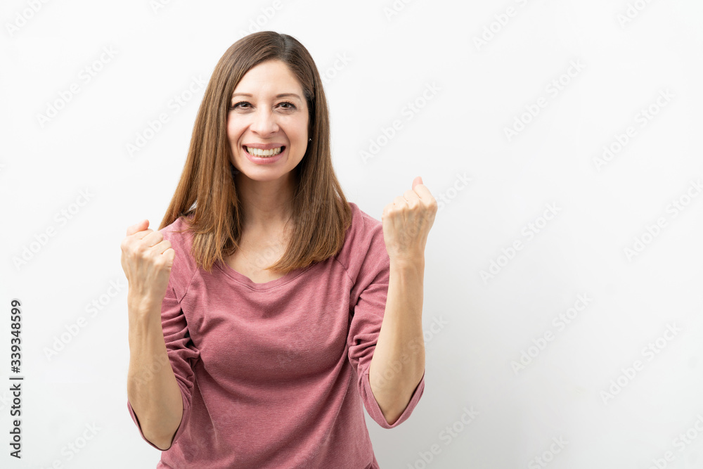 Fototapeta premium Happy woman celebrating good news