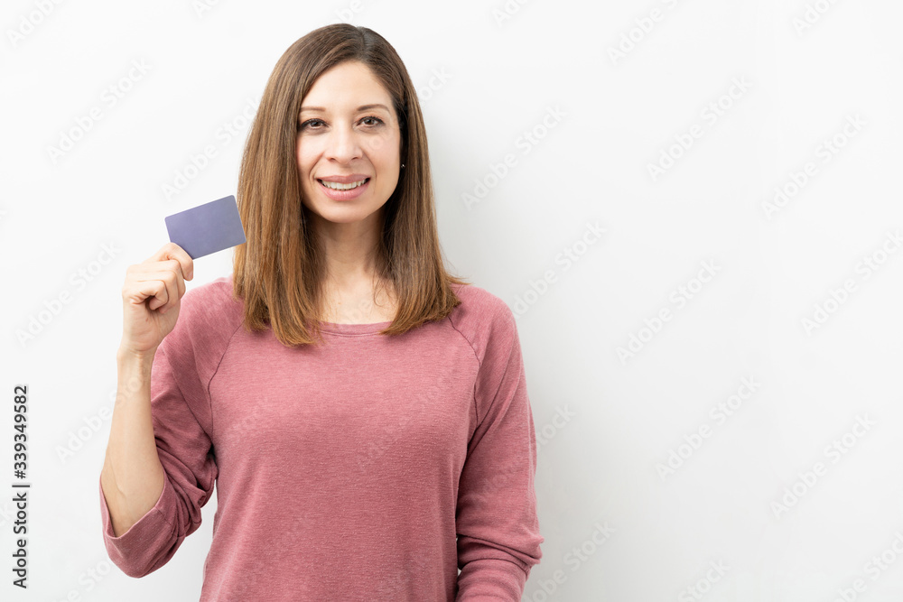 Happy woman with a credit card Happy woman with a credit card