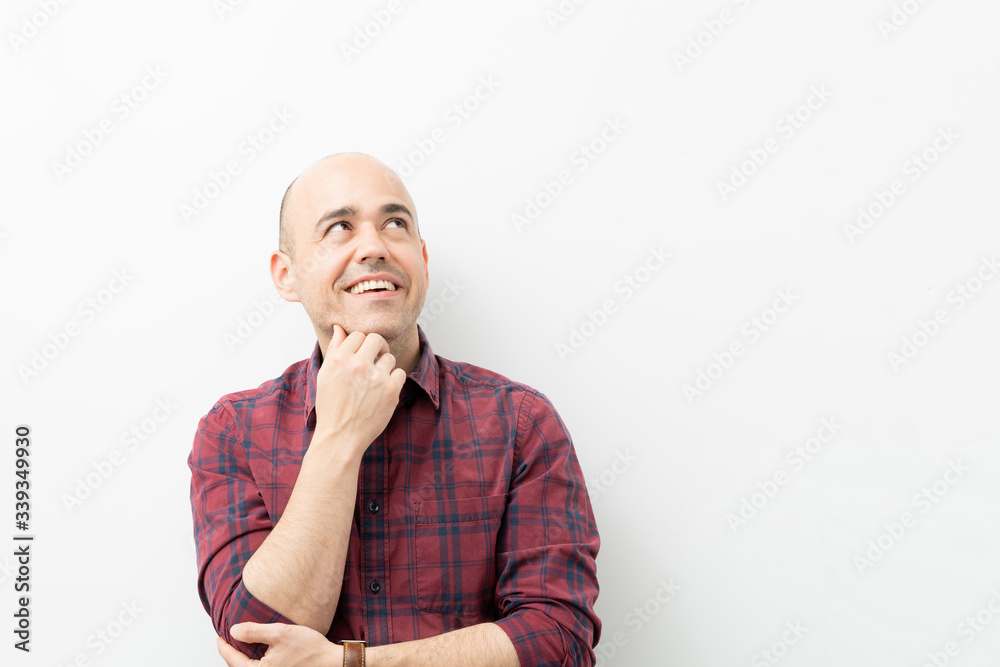 Attractive man looking towards copy space Attractive man looking towards copy space