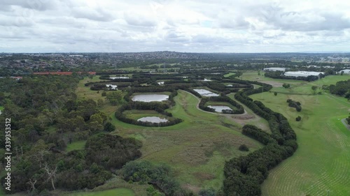 Slow descend over beautiful park in Melbourne, Australia photo