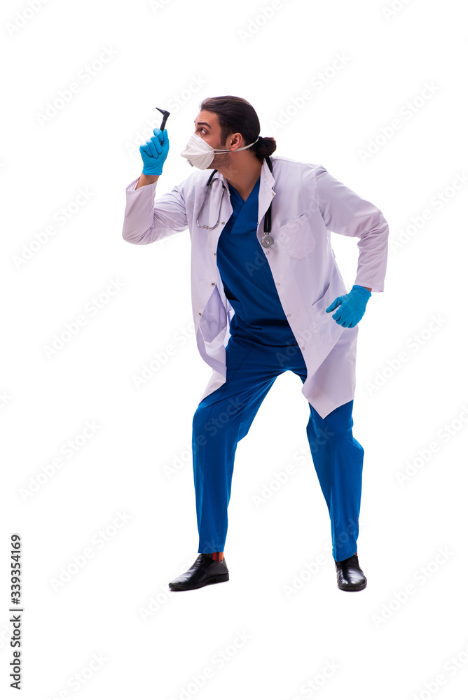 Young male medic in coronavirus concept isolated on white Young male medic in coronavirus concept isolated on white