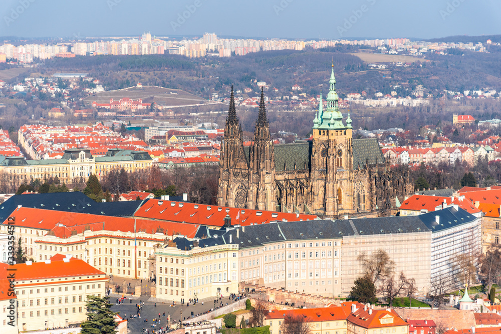 Fototapeta premium Aerial view of Prague Castle, Czech: Prazsky hrad, with Saint Vitus Cathedral. Panoramic view from Petrin lookout tower. Prague, Czech Republic