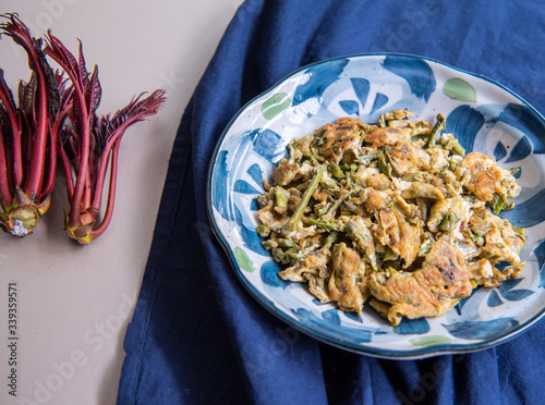 Fried Eggs with Toona Sprouts photo